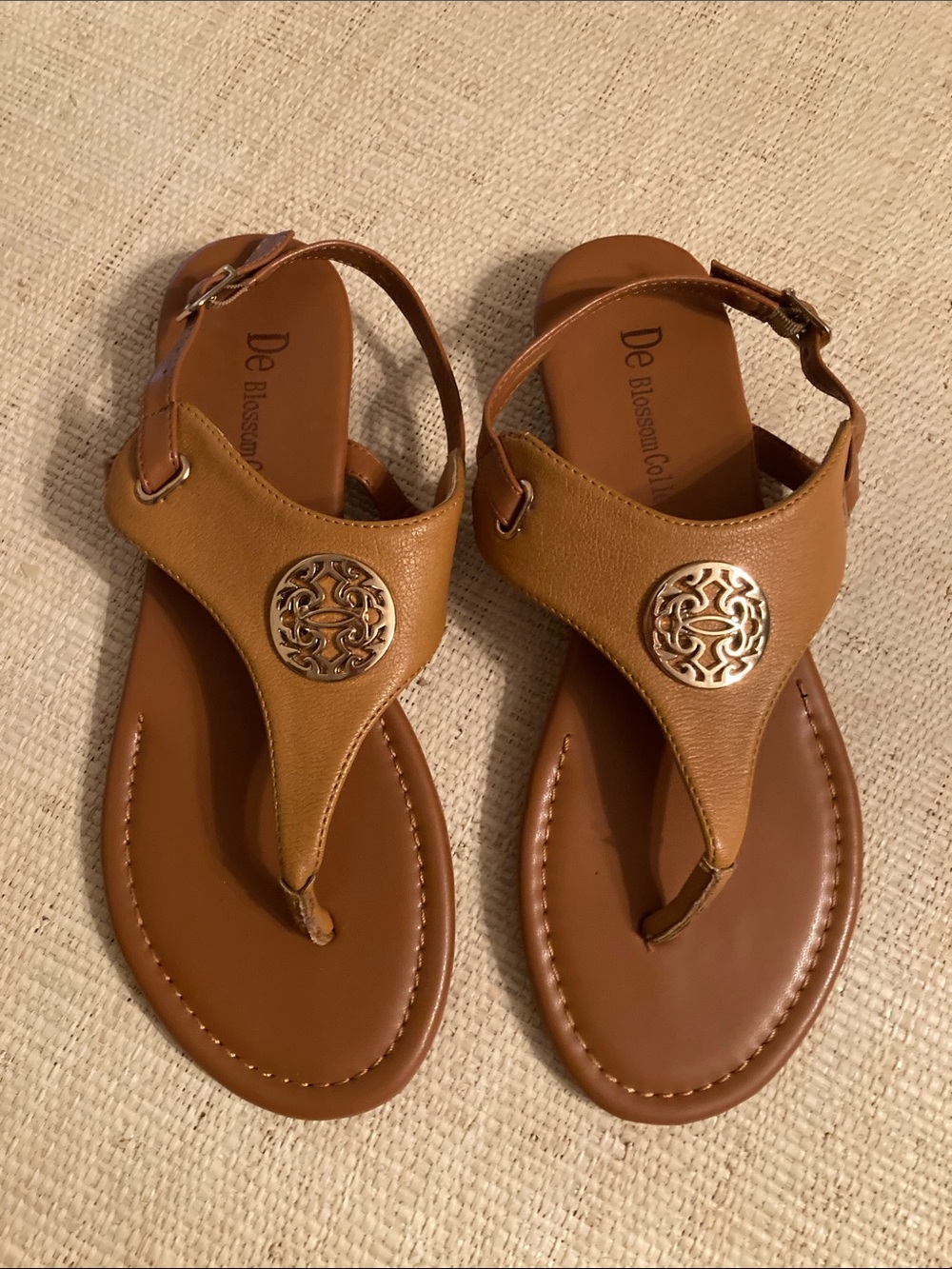 De Blossom Collection Women's Tan T-Strap Sandals with Gold Medallion